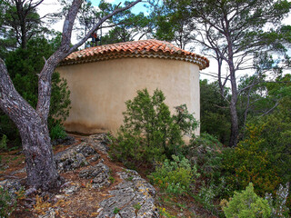 Village of Sillans-la-Cascade in Green Provence. The chapel Saint-Laurent on a hill above the...
