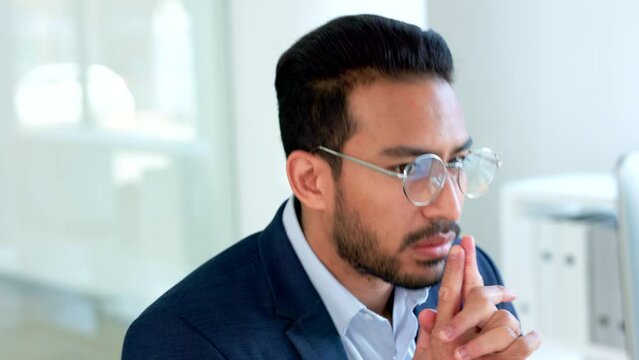 Software engineer thinking of a solution for desktop web operating system. Thoughtful male IT specialist or expert using his problem solving skills to solve and analyze company data management issues