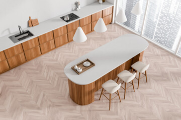 Top view on bright kitchen room interior with island
