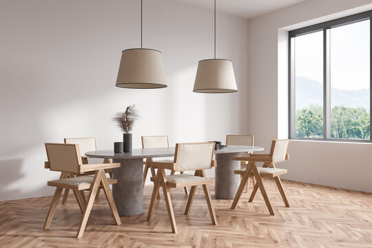 Corner view on bright living room interior with dining table