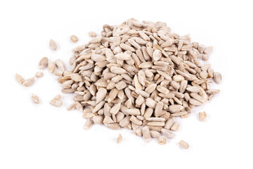 Pile of peeled sunflower isolated on white background.