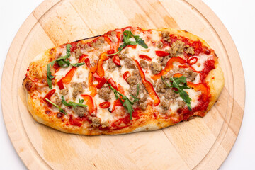 Delicious pizza served on wooden plate. Concept for advertising flyer and poster for restaurants or pizzerias, template with delicious taste of pepperoni.