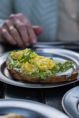 avocado and egg toast with escarole
