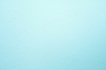 Fototapeta premium abstract, rough plaster wall texture is light blue for backgroun