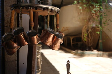 Traditional Turkish coffeepot made of copper , handcraft turkish coffee pot hanging on souvenir...
