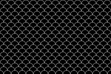 Black fish scales or mermaid scales pattern background.
