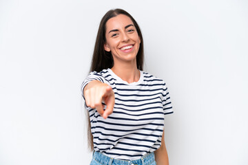 Obraz premium Young caucasian woman isolated on white background pointing front with happy expression