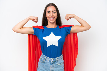 Young caucasian woman isolated on white background in superhero costume and doing strong gesture © luismolinero