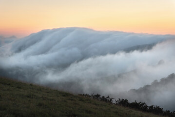 Sunset in Baztan with clouds hugging mountains
