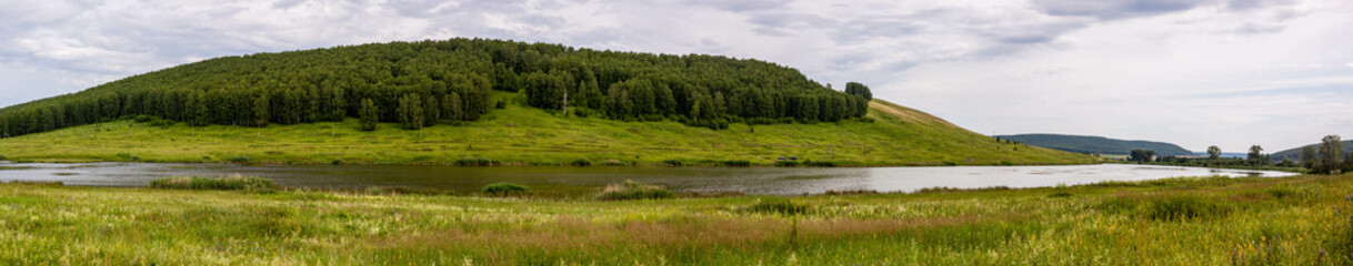 Panorama of the forest mountain range near the village of Bolshiye Karzi.
Панорама на лесной горный массив близ села Большие Карзи. 