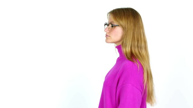 Young pretty blonde woman with glasses in side position
