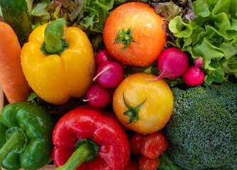 Top view Wooden crate filled with fresh organic vegetables..