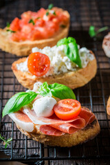 Healthy mix of bruschetta as classic snack for breakfast.