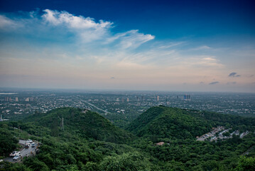 Fototapeta premium City view of Islamabad Pakistan from mountains of Margala