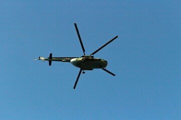 Helicopter in sky. Air transport flies across sky. Flight details.