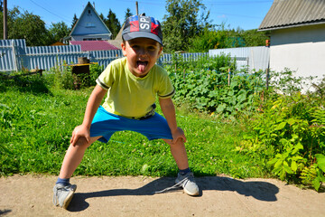 child surrounded by flowers