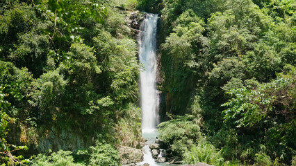 Naklejka na ściany i meble pretty waterfall in the forest