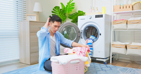 man irritated about laundry