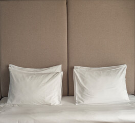 pillows on the bed for a couple