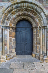 Fototapeta na wymiar Black classic door to the Saint Marys Church, Kirkby Lonsdale. Cumbria, England.