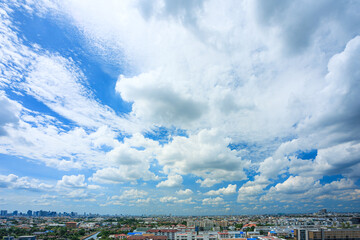 Fototapeta na wymiar Aerial View Of Cityscape Against Blue Sky