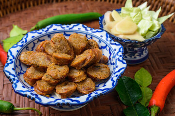 Notrhern thai spicy sausage on the porcelain product.
