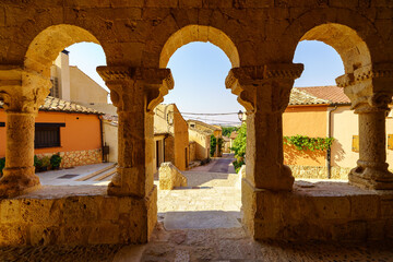 Romanesque cloister with stone arches in the church of San Miguel in the village of San Esteban de Gormaz.