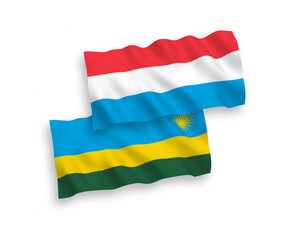 Flags of Republic of Rwanda and Luxembourg on a white background
