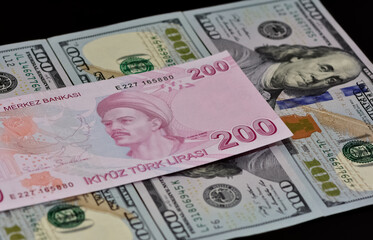 Obraz na płótnie Canvas various country banknotes. photos of usa and turkish lira.