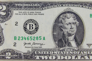 Macro shot of the two dollars bill