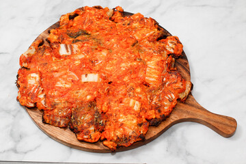 Kimchi Pancakes on bright background.