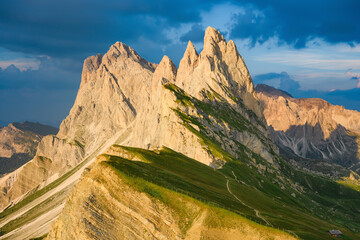Breathtaking view of Seceda during a beautiful sunset. The Seceda with its 2.500 meters is the highest vantage point in Val Gardena, Dolomites, Italy. - obrazy, fototapety, plakaty