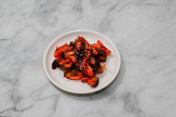 Seasoned hot Conch on bright background.