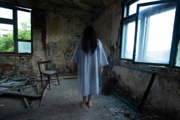 Scary ghost woman in haunted house