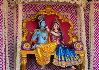 Colorful life size idols of Krishna, Radha sitting at Prem Mandir temple. Happy Krishna...