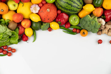 Fitness concept. Healthy nutrition: fruits and vegetables. Equipment for fitness exercises: weighing machine and dumbells. White background.