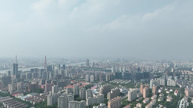Buildings and roads in the city crowded buildings. Drone aerial view. Tones of building in downtown area Shanghai China.  Economy, city scape and house development  concept b-roll footage.