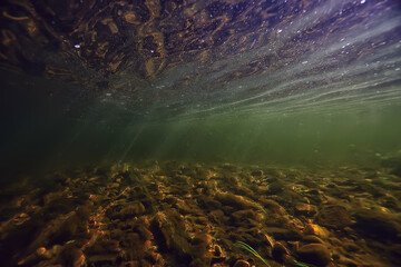 sun rays under water landscape, seascape fresh water river diving