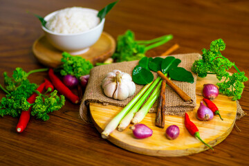 Spices and condiments on a wooden table