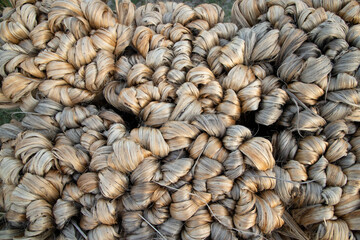 thick brown bundle of raw jute fiber Texture Background