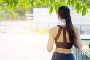 Fototapeta na wymiar sport woman standing relax after outdoors exercise. healthy lifestyle people with copy space.