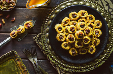 Arabic cuisine; Middle Eastern traditional pastries and Ramadan famous dessert "Kunafa" with roasted pistachio. 