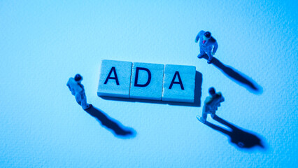 blue businessman at ADA words