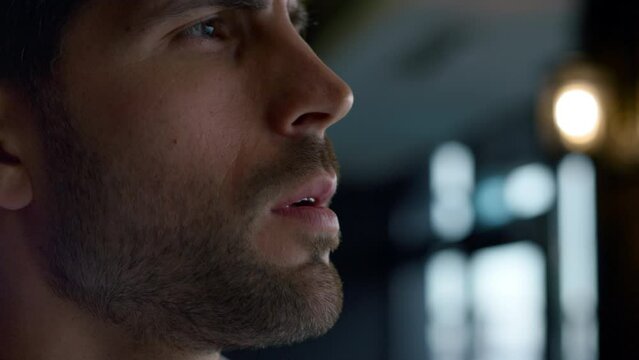 Closeup thoughtful businessman looking away in cafe. Serious decision concept