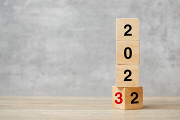block flipping 2022 to 2023 text on table. Resolution, strategy, plan, goal, motivation, reboot, business and New Year holiday concepts