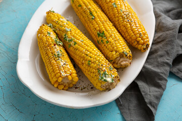 Sweet corn cobs with butter grilled food