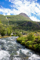 Fototapeta na wymiar Geiranger water fall Storseterfossen (also Storsæterfossen) Møre og Romsdal at Geirangerfjorden in Norway (Norwegen, Norge or Noreg)