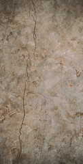 Destroyed cracked wall background, brown light texture, paint streaks.