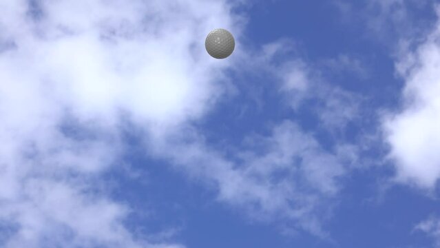 A Golf Ball Flying Towards The Camera Against A Blue Sky With Clouds