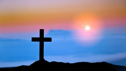 Silhouette Cross on the mountains